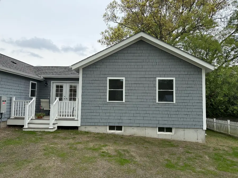 Gray in-law suite addition built onto the back of a Rhode Island home by JB Cote Construction