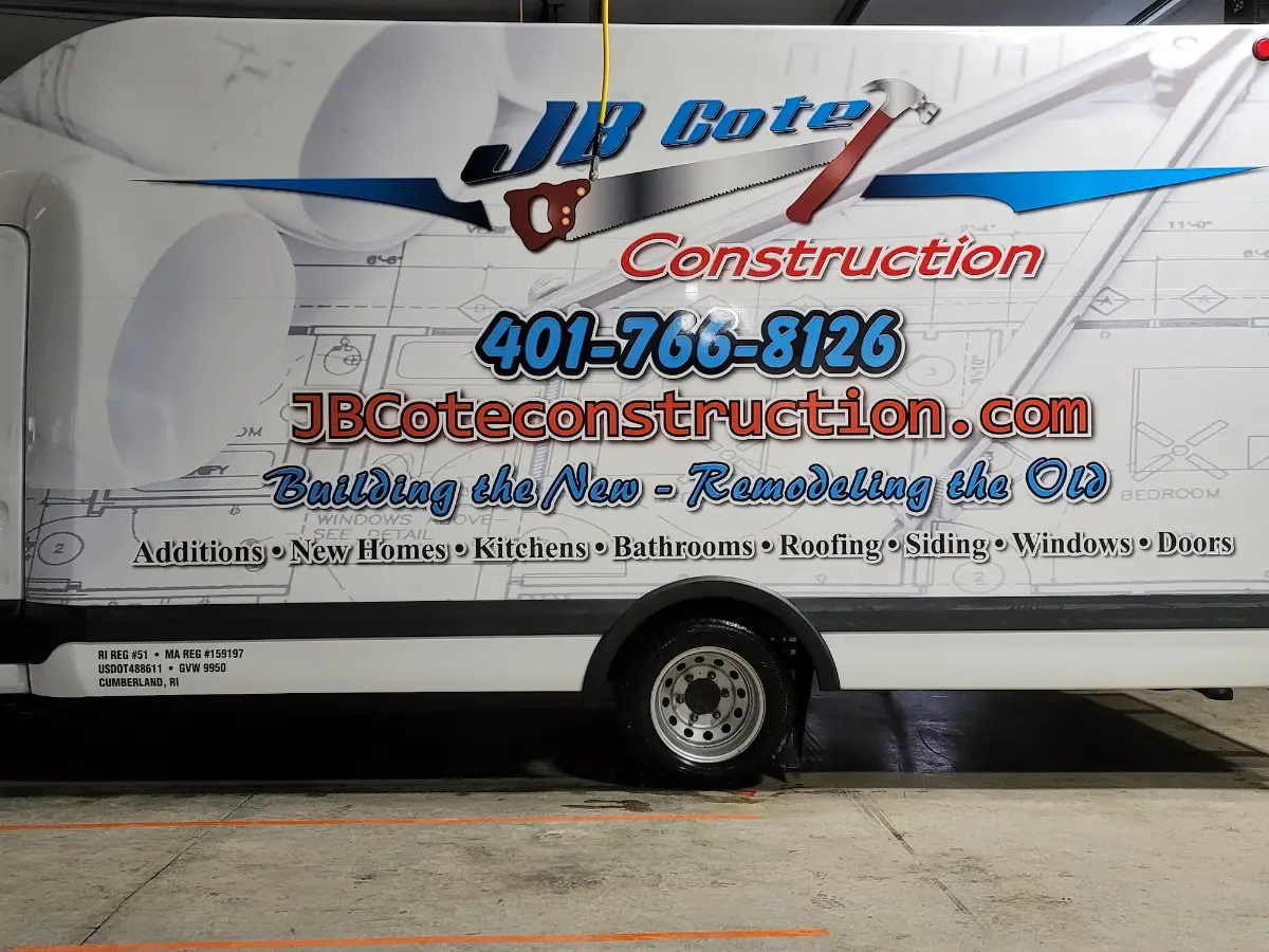 JB Cote Construction box truck with the company name, website, and list of services on the side